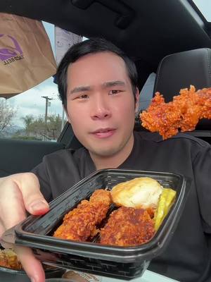 A post by @asianchowdown on TikTok caption: TRYING KFC NASHVILLE HOT CHICKEN TENDERS #mukbang #foodreview #food #eating #fyp #popeyes #kfc #friedchicken #Foodie #fastfood 