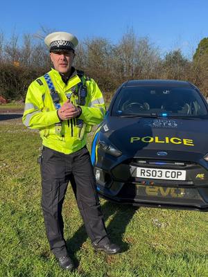 A post by @georgescarmedia on TikTok caption: The UK’s Fastest Police Car is a Modified Focus RS! As a roads policing sergeant with Devon & Cornwall Police, Owen is showcasing our modified Focus RS that has been paid for by Vision Zero Southwest and built in conjunction with the Performance Automotive Aftermarket Association. I'll take you through the various modifications on the car, including the low line kit, Revo performance pack, big brake kit, sports cat exhaust, and more. The goal is to educate viewers on what can and can't be done to their own cars legally. #police #policecar #modifiedcars #carscene #roadsafety