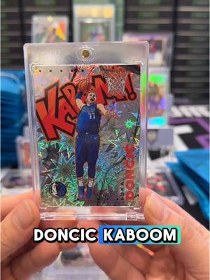 A post by @thebreakroom_tbr on TikTok caption: That is so up right now! LUKA DONCIC KABOOM 💥 how high will Lukas value rise on the Lakers?  #sportscard #sportscardscollector #sportscardsinvesting #sportstiktok #whodoyoucollect  #auto #NBA #cardbreaks #livebreaks #football #nfl #rookie #paniniamerica #basketball #footballcards #basketballcards #baseball #MLB #baseballcards #tradingcards #prizm #fanatics #topps #lukadoncic #lakers #CapCut 