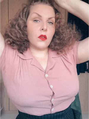 A post by @hollandschmeisje on TikTok caption: Some 1940s style masculine fashion for women, signature red lips and a little attitude. Have a fab day 💋  Lippy is Vintage starlet by @Dafna Beauty  Amazing trousers by @Sunny van Zijst and blouse by @Weekend Doll Brooch is @Luxulite Remember to shop small, folks! Rest is thrifted/vintage. 