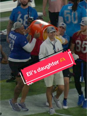 A post by @nygiants on TikTok caption: Always looking out for dad 💙 #nfl #ProBowl #elimanning #nygiants #giants 