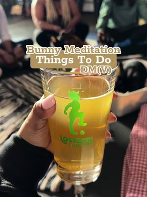 A post by @morgsvstheworld on TikTok caption: 🐇Things To Do - DMV: Bunny Meditation🐇 📍Lost Boy Cider - Alexandria, VA 💰$35 📆classes are subject to bunny availability (more events will come in the future - I recommend following @Beth A Wolfe Yoga for updates on the classes) ⏰ times vary based on availability Join a group of individuals and fluffy adoptable bunnies from the House Rabbit Society at Lost Boy Cider in VA! This was a meditation class that I enjoyed this previous weekend. I started with a glass of Pomander Cider which was a tasty apple treat before cuddling with the rabbits. These are fragile animals so holding and picking them up isn’t too common unless they’re comfortable with you doing so (all rabbits are different). But throughout the class, these fur babies hopped all around, sniffing us curiously & cleaning their cute faces! Along with Beth’s other animal experiences, this one takes the cake for someone in need of some love, tender care, or just a day to unwind from the outside world♥️ —----------------- #hoppyhour #thingstodova #thingstodoindc #thingstodoinvirginia #visitdc #dmvdateideas #alexandriava #dmvthingstodo #visitvirginia #washingtondc #exploredc #bucketlistideas 