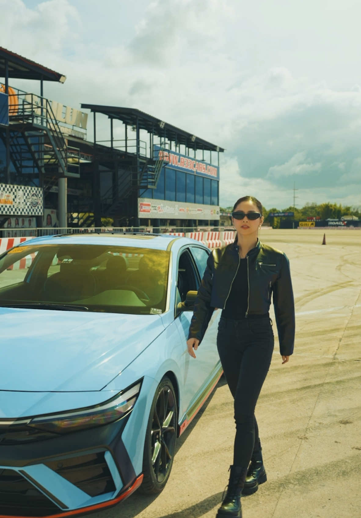 A post by @kimberlysuechiu on TikTok caption: Ever driven a car that performs as good as it looks? That's what you get with the Hyundai ELANTRA N! Love how this car can make any casual drive an exciting one! 🙌🏼🩵 @Hyundai Worldwide  #NeverJustDrive #HyundaiN #HyundaiMotorPhilippines