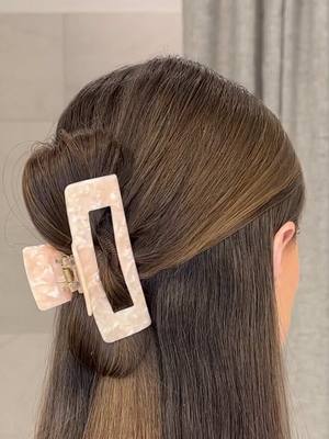 A post by @moniquemrapier on TikTok caption: ya live & ya learn 🤷🏻‍♀️ the BEST way to elevate a half-up hairstyle!! obsessed with this & will be living in it all spring + summer long!  . #easyhairstyles #hairtutorial #hairtok #clawclip #clawcliphairstyles #halfuphalfdown #halfuphairstyle #summerhair #summerhairstyles  #cutehairstyles