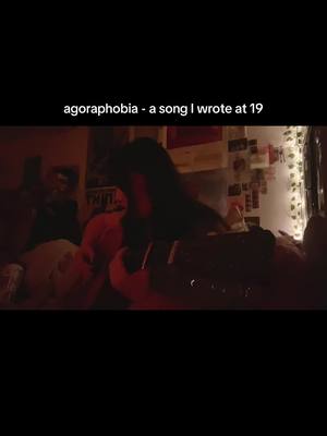 A post by @jungoojuul on TikTok caption: I’ve only shared one other original before but I was rewatching this and felt the need to share. I’m very proud of this song and It came from a really deep place in my life at that time and I still find myself relating to it. Maybe it’ll help you the way it helped me? #originalmusic #original #singersongwriter #singer #guitar #fingerpicking #originalsong #agoriphobia #anxiety #disabilityawareness 