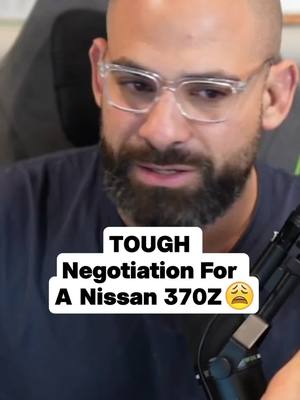 A post by @georgejsaliba on TikTok caption: Dude wants to trade his Nissan 370Z for a GTR, but the negotiation gets heated over this. #nissan #370z #gtr #carmodification #cardealership #fy #fyp 