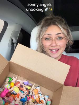 A post by @arianalee99 on TikTok caption: Real vs Fake ! Sonny angels unboxing! 🪽✨💖#unboxing #sonnyangel #sonnyangels #sonnyangelunboxing #realvsfake #vlog 