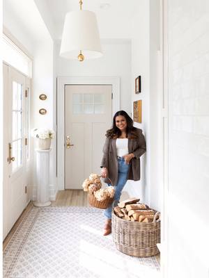 A post by @nabela on TikTok caption: At last…the new kitchen hallway light has arrived and the space feels completely refreshed! 🤍 It’s amazing how much impact the little details can make.  Our kitchen hallway also serves as our courtyard entrance and leads to our garage + carriage house. Having it feel like a warm welcome and transition space has made all the difference.  Back to my moodboard to dream up the next corner of our new, old home 🥹 #pocketsofpeace #nabelanoorhome #design #homeimprovement #homedecor #interiordesign #designer #style #historichome #antiquing #thrifting #makeover #transition #DIY #transformation 