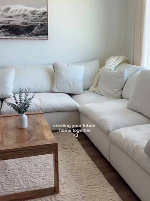 A post by @caitlinkellnerr on TikTok caption: counting down the months until we’re married & living here 🥹🕊️ @Mario Capasa #engaged #homedecor #homedecorideas #sectionalcouch 