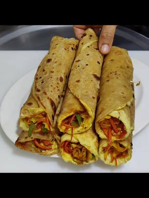 A post by @kitchenfood25 on TikTok caption: Restaurant Style Egg Roll Breakfast Recipe_Viral#Cooking #FoodRecipe #EasyRecipes #unitedkingdom #foryoupage❤️❤️