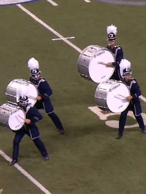 A post by @bluecoats on TikTok caption: The Bluecoats: 🏃🥁🏃 The field judge: 🏃🧍🏃 #KineticNoise