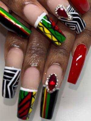 A post by @nailzbylaquinta on TikTok caption: ♥️💚💛 #nailzbylaquinta #blackhistorymonthnails 