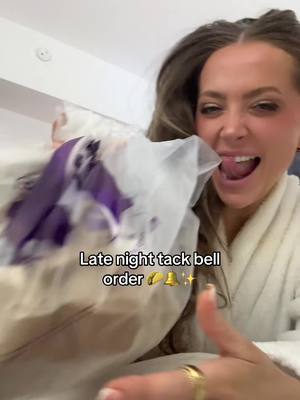 A post by @abbybaffoe on TikTok caption: Take my phone away honestly HAHAHAHA (also mind your biz yes I’m eating in my bed I had a 17 hour day leave me alone) #tacobell 