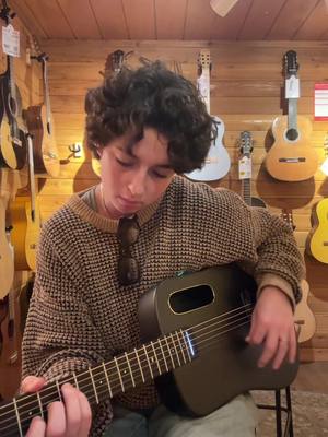 A post by @sam_wyatt on TikTok caption: took myself on a date to guitar center 