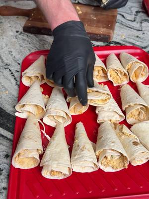 A post by @fooddudescook on TikTok caption: Buffalo chicken tortilla cones #easycooking #Foodie #gameday