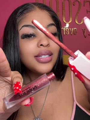 A post by @zoesqoq on TikTok caption: I love non gritty lip gloss #lipgloss #glitterlips #makeup 