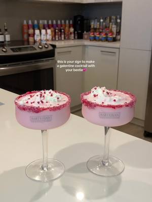 A post by @jaaliyahs on TikTok caption: The prettiest galentine’s drink😍 #galentinesday #galentines #trending #vday #ValentinesDay #fypシ #prettyinpink #strawberriesandcream #girlsnight #viralvideo #cocktails #homebartender 