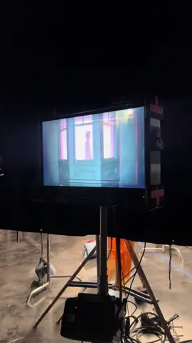 A post by @alyankovic on TikTok caption: My daughter visited the set the day we shot the Clairo video - here’s some sneaky “behind the scenes” footage she shot on her phone