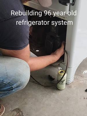 A post by @dustyoldstuff on TikTok caption: A neglected early Sulfur Dioxide Charged Leanord Refrigerator is getting another chance. #vintage #refrigerator #restoration #1930s 