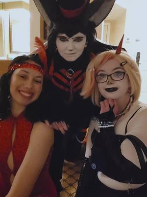 A post by @foxboi_cos on TikTok caption: Burlesque show fits 😽🥃 @Alex Dani @Iris☁️ #Husk #CharlieMorningstar #Mimzy #HuskCosplayer #MimzyCosplay #CharlieMorningstarCosplay #HuskCosplay #HazbinHotel #HazbinHotelCosplayer #HazbinHotelCosplay 