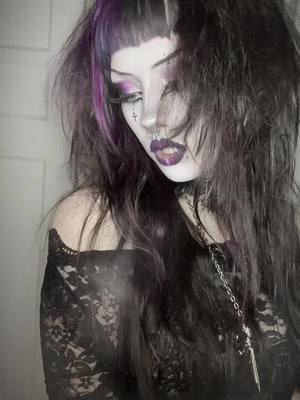 A post by @skeletslet on TikTok caption: 💜#goth #gothic #alternativegirl #vampiregirl #gothicstyle #tradgoth #gothicgirl #tradgothmakeup #gothicmakeup #gothmakeup 