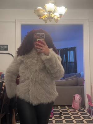 A post by @angiexroman on TikTok caption: The perfect fit coat ootd #furcoat #OOTD #nyfw #tiktokshoploveatfirstfind 