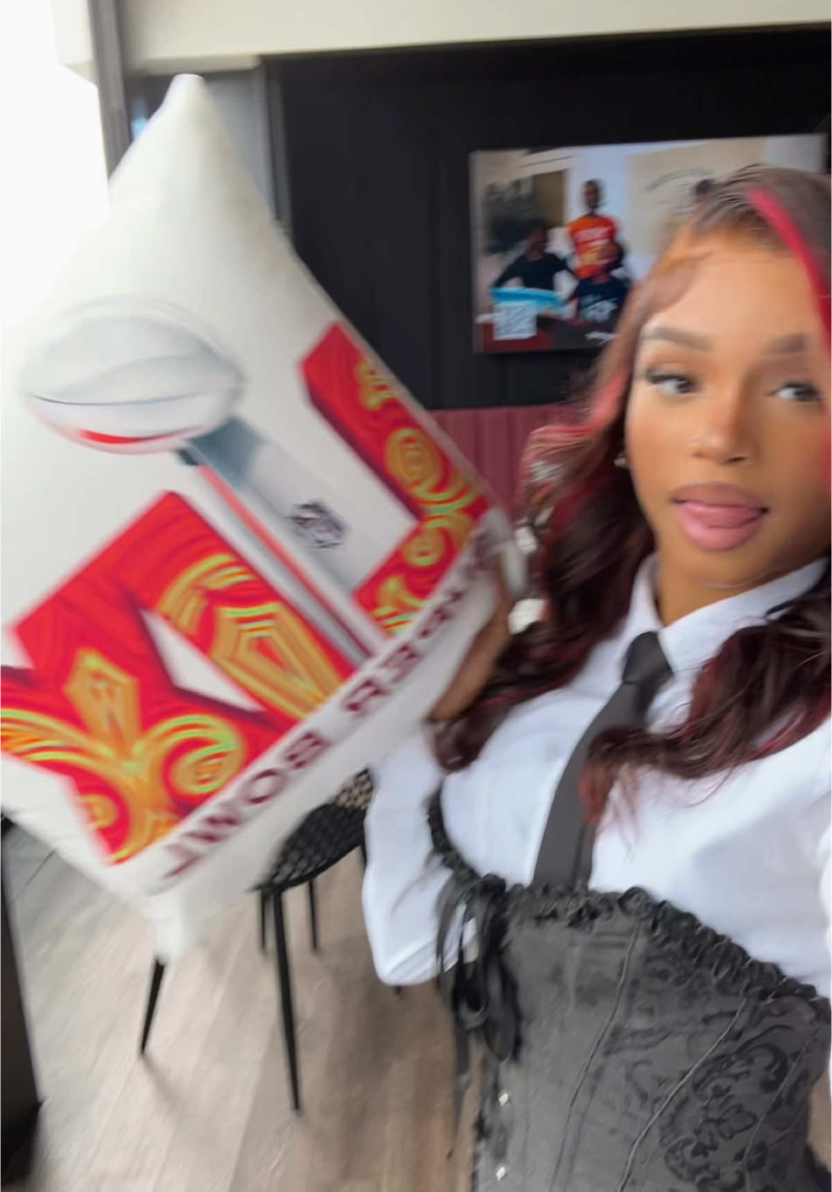 A post by @zoemieyah on TikTok caption: Come watch the Super Bowl @V12RestaurantATL 🏈🍾