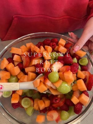 A post by @brooklynrreidhead on TikTok caption: SUPERBOWL fruit bowl🏈💫 go chiefs❤️ #fruitbowl #fruitprep #viral #SuperBowl #superbowlfood #foodtiktok #fruit #fruitsalad #fyp #foryou #asmr #asmrsounds 