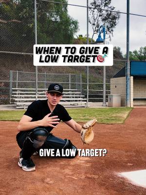 A post by @catchingmadesimple on TikTok caption: Should catchers always give a low target? 🤔 Most of the time—yes. But not always. ⚾ Calling a low pitch? Get low and work under the ball. ⚾ Calling a high fastball? Stay tall and set your glove higher to get on top. Small adjustments = Big results💯 I'm running a remote receiving clinic THIS SATURDAY from 9-10 AM PST DM me CLINIC to sign up! 💪🏽 #CatchingMadeSimple #Baseball #softball #receiving