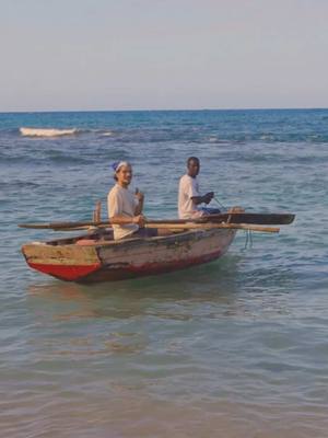 A post by @nicolasnuvan on TikTok caption: Beach w/ Haitian Fisherman🇭🇹