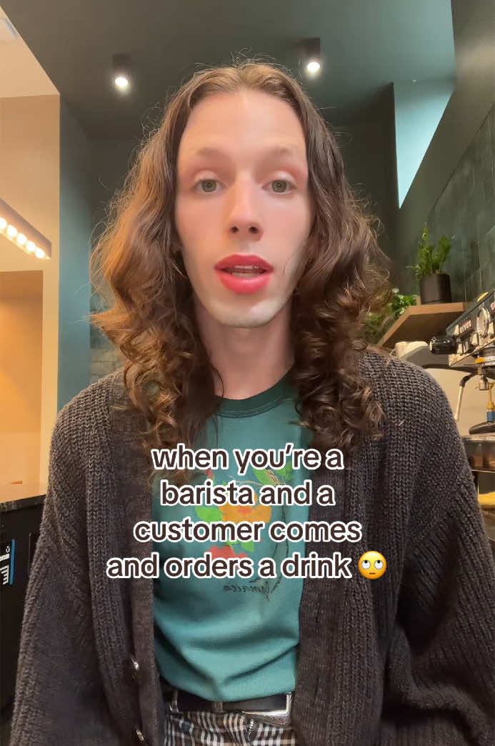 A post by @codalimarcus on TikTok caption: 😩 can’t I just sit here and be pretty 🤭?!#barista #cafe #coffee #lol ☕️