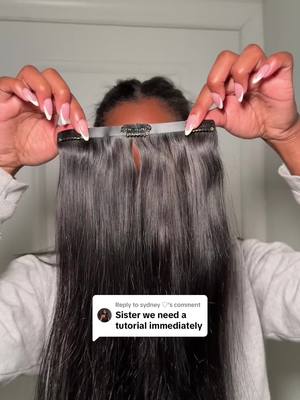 A post by @xen.rodriguez on TikTok caption: Replying to @sydney ♡  the key is to cut your clip ins if you need to adjust them to your liking!  #clipins #clipinsforblackgirls #clipintutorial 