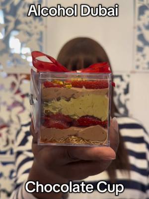 A post by @bougieboozybears on TikTok caption: We have the worlds first boozy Dubai chocolate cup, this bad boy is going to be available on 2/13-2/14, in-store only!!!! Get it while it last!  #dubaichocolate #dubaichocolatecoveredstrawberries #bougieboozybears 