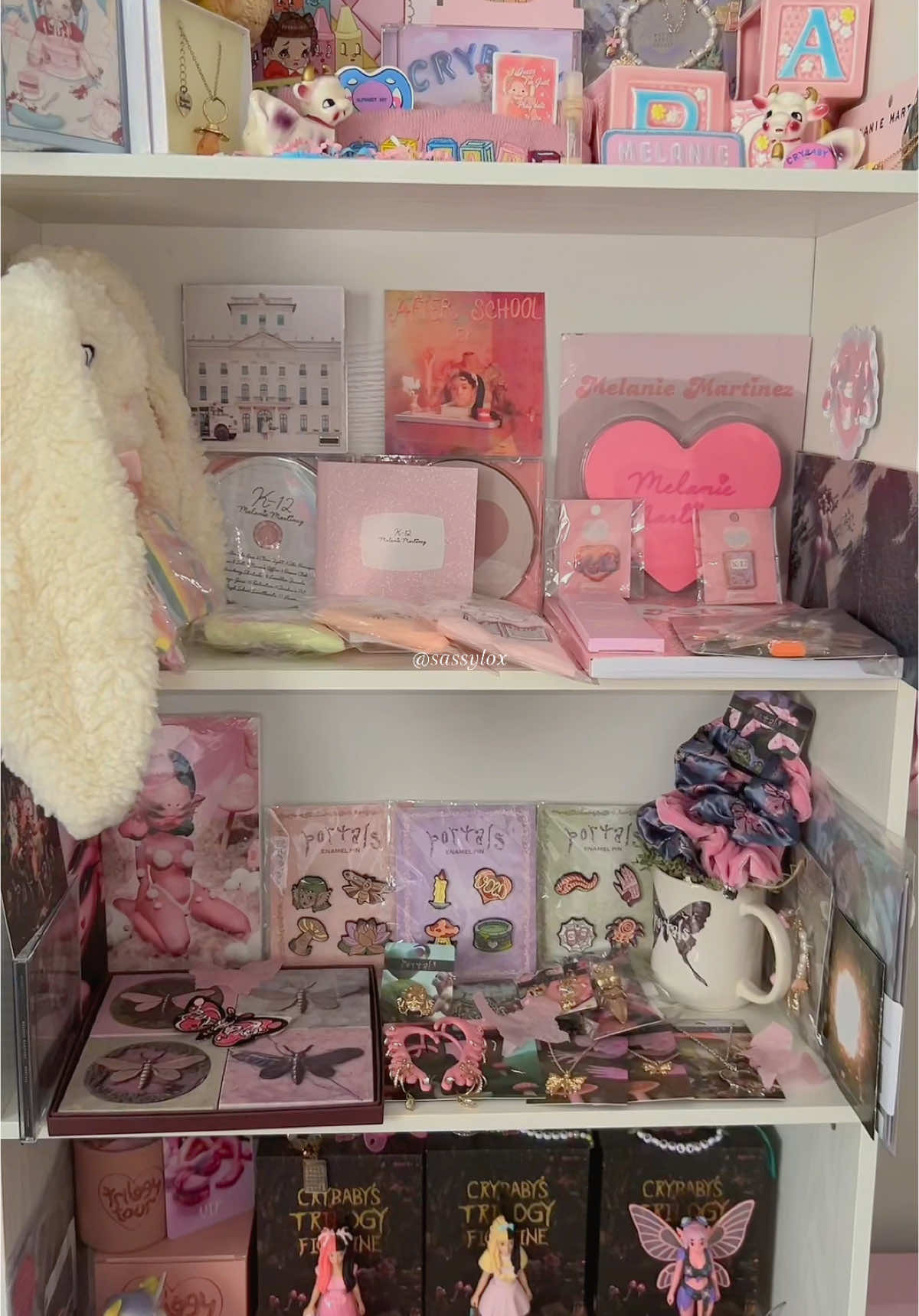 A post by @sassylox on TikTok caption: most of my collection 🩷 #melaniemartinez #melaniemartinezcollector #melaniemartinezcollection #sassylox 