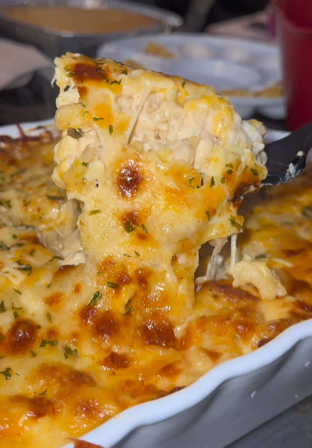 A post by @jordanramsy on TikTok caption: loveee day mac & cheese 💋 #jordanramsy #macandcheese  2 cups heavy cream 1 cup milk 1 cup evaporated milk 1 1/2 box of elbow noodles  salt 1 tbsp chicken bouillon  5 tbsp unsalted butter 3 tbsp flour  spice blend: 1 tsp cajun  1 tsp garlic powder 1 tsp onion powder 1 tsp pepper 1/2 tsp smoked paprika 1/2 tsp nutmeg (combine) 8oz smoked gouda  8oz smoked gruyère  8oz freshly grated mozzarella  16oz extra sharp cheddar white  16oz extra sharp cheddar yellow Bake at 375 for 35 broil for 3-5 minutes. 
