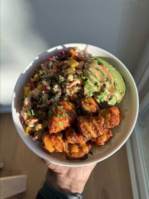 A post by @emmanuelduverneau on TikTok caption: One of my favorites; Salmon coconut rice bowl Recipe: -Salmon, cut into cubes: 1 Tbsp olive oil salt  pepper smoked paprika chipotle chili powder garlic powder onion powder -Cover salmon with olive oil and seasonings. Place on a sheet pan lined with parchment paper and convection bake at 400°F for 9-12 minutes. -Mango Salsa: 2 mangos, chopped into cubes 1 1/2 cups red cabbage  1 1/2 cups green cabbage 1 large carrot, julienned  1/4 medium red onion, thinly sliced  salt and pepper to taste  1/4 cup cilantro, chopped  1/2 a lime, juiced 1 Tbsp honey  -Combine all ingredients in a bowl and store in the fridge until ready to use. -Spicy Mayo: mayonnaise  sriracha  honey -Add desired amount of each to a bowl and mix. Add more sriracha for a spicier sauce and more honey for a sweeter sauce. -Coconut Rice: 2 cups jasmin rice washed and rinsed  14 oz coconut milk 1/2 cup water 1/2 tsp salt 1 bay leaf (optional) 1 Tbsp olive oil -Rinse rice under water until the water runs pretty clear, then drain. Add rice, coconut milk, water, and salt into a saucepan over medium high heat. Add bay leaf and about 1 Tbsp of olive to prevent the rice from sticking to the pan. Add the rice. Stir until most of the water is absorbed by the rice. Cover and simmer on low for about 15-20 minutes. -Serve with avocado, top with chopped cilantro, and enjoy! #foodtiktok #salmon #EasyRecipe 