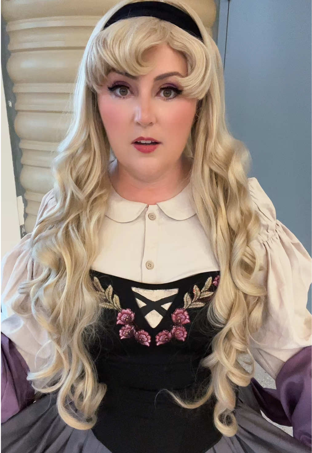 A post by @thedisneybelle on TikTok caption: If you say so Phillip… 👀 #disney #sleepingbeauty #aurora #megacon #megaconorlando 