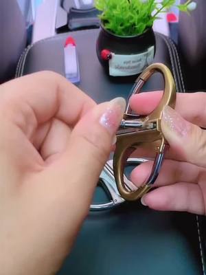 A post by @goodiesarehere on TikTok caption: Mountaineering Buckle Hello Tinder Keychains #unique #tinder  