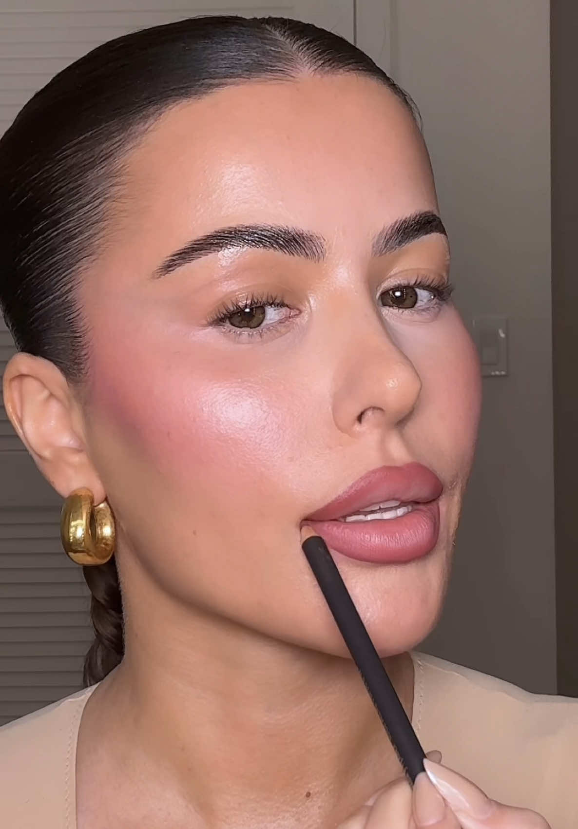 A post by @amrezy on TikTok caption: Get ready with me 🩷  Products linked in my LTK