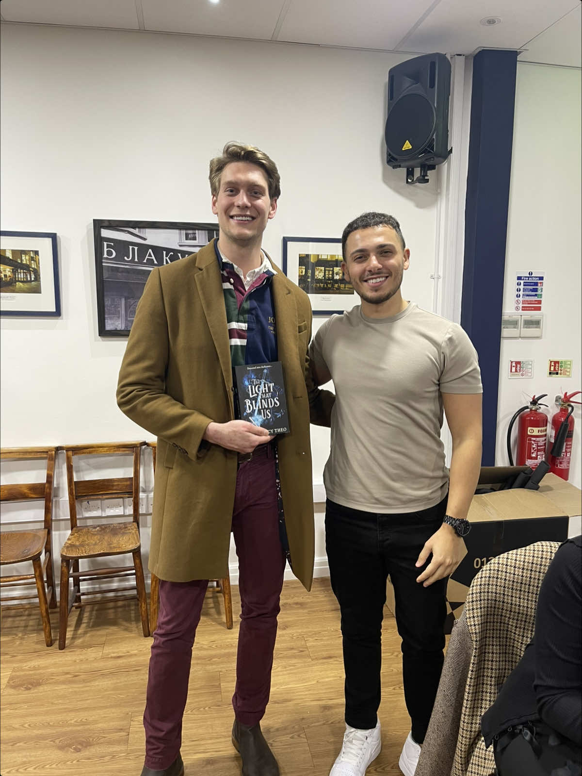 A post by @d.c.readsbooks on TikTok caption: Part 1 | Our first book event 📚 . . . . . . . #book #📚 #BookTok #fantasy #bookboyfriend #bookrecommendations #fantasybook #booktoker #bookevent #booksigning #bookstagram #bookstore #read #reading @Andy Darcy Theo ✍🏼📚 @blackwellbooks #romancebooks #yabooks #yabooktok 