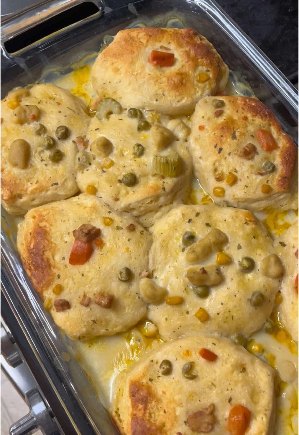 A post by @chers_scent_spot on TikTok caption: Looking for a good quick meal try this one!! One pack of pillsbury biscuits, 2 or 3 cans ( I used 2) of either Chicken pot pie or Chicken and dumplings soup. Pour into a baking dish and bake at 375 for about 30-35 mins!! Enjoy! #pillsburysouprecipes #goodfood #yummy #quickmeals #easymeals #fyp #comfortfood 