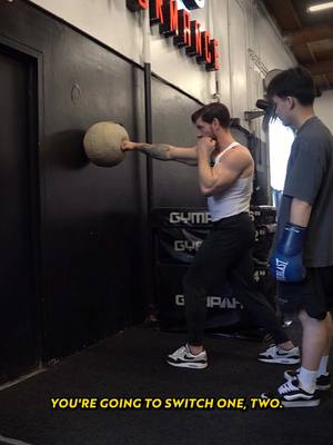 A post by @alexandrudiaconufitness on TikTok caption: Every workout is CHALLENGING and we learn something new 💪🏆 This was Anh’s third session in his journey of learning to improve his JAB and CROSS 😎🏆 His main goal was to focus on FULL RANGE, PRECISION, COORDINATION and SPEED ✅ Trying to lock a med ball to the wall using jabs and crosses is a very FUN and EFFICIENT way to improve your striking skills 🏆💪 For only the third time striking @anhlle_ did AMAZING!!! 😎🏆 How many do you think you got?! 💪💪😎  Have a great day, Stay DETERMINED‼️ #alldetermined #kickboxing #punch #speed #training #challenge 