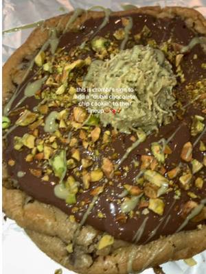 A post by @jaaliyahs on TikTok caption: @Crumbl 👀 #dubaichocolate #chocolatechipcookies #crumbl #trending #cookierecipe #fypシ #homebaker #viralvideo #dubaichocolatebar #pistachio #kunafa 