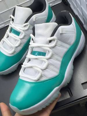 A post by @coreytheeartist on TikTok caption: Jordan 11 Lows in Teal Colorway! 🔥🔥🔥🔥 #customshoes #art #fyp #viral #sneakers #jordan #painting #design 