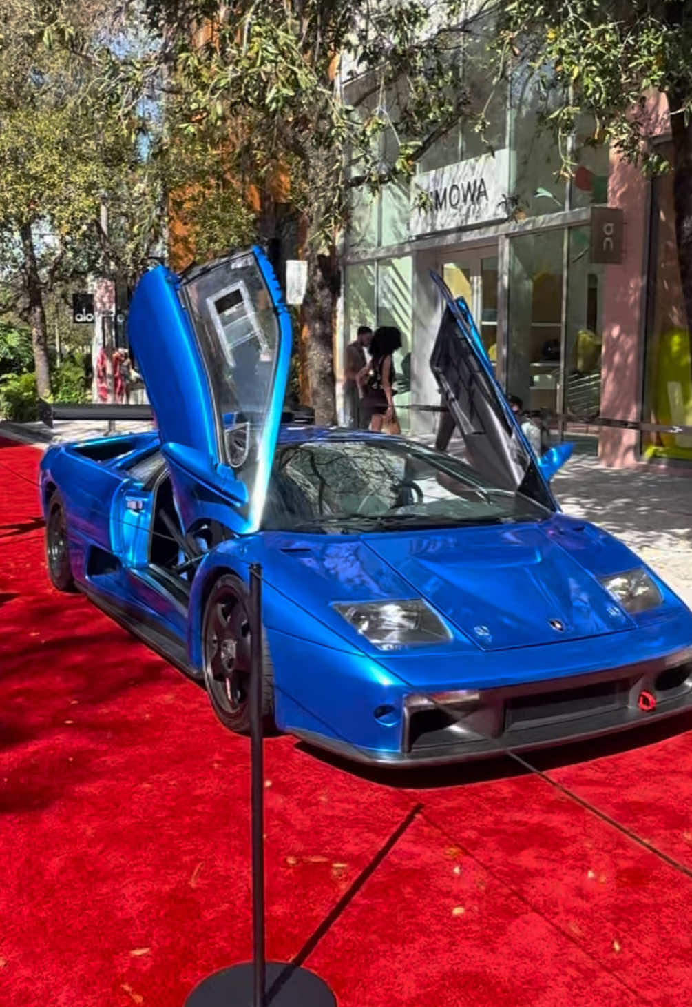 A post by @miamidesigndistrict on TikTok caption: This year’s @miamiconcours was definitely one for the books. Which car was your favorite? 🏎️❤️‍🔥#MiamiDesignDistrict 