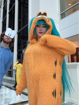 A post by @swaggy_cucumber on TikTok caption: Jon said to dance for lasagna (I accidentally put a filter LOL) @Seth #garfieldmikucosplay #garfield #miku #hatsunemiku 