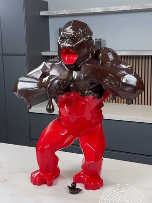 A post by @amauryguichon on TikTok caption: Trying something new 🦍! With my friend Richard Orlinski. #amauryguichon #richardorlinski #chocolate #kong