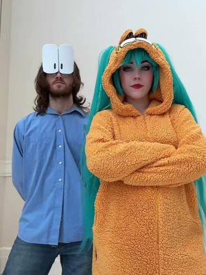 A post by @swaggy_cucumber on TikTok caption: THE EYES HAHAHA #garfield #miku #mikucosplay #cosplay 