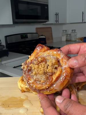 A post by @daronthechef on TikTok caption: Peach Cobbler Stuffed Cinnamon Rolls  Frozen Peached 2 cups I diced mine  3 Tablespoons of Butter  1 Half Cup of Granulated Sugar  1 Half Cup of Brown Sugar  1 Tablespoon of Cinnamon  2 Teaspoons of Nutmeg  1 Half of A Lemon (For juice)  2 Teaspoons of Vanilla Extract  Cornstarch Slurry = 1 Tablespoon of Water x 1 Tablespoon of Corn Starch   Crumble: 4 tablespoons of Flour 3 tablespoons of Brown Sugar 3 Tablespoons of Melted Butter 2 Teaspoons of Cinnamon + Nutmeg. It should be crumble-lee 😭 if it’s not add more flour. #daronthechef #dessert 