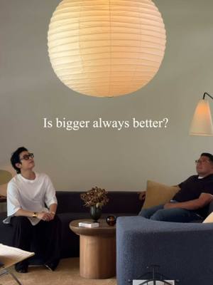 A post by @arvinolano on TikTok caption: We spent the weekend trying to find the right pendant for the living room. I love the idea of something oversized, but the scale felt off. Then I remembered we had a smaller pendant in storage—one we’ve had since we first moved in—and now I’m loving it even more! So, no… maybe bigger isn’t always better. #midcenturydesign #midcenturyhome #noguchi #interiorstyling #poulkjaerholm